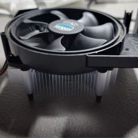 With Cooler Master fan and trim